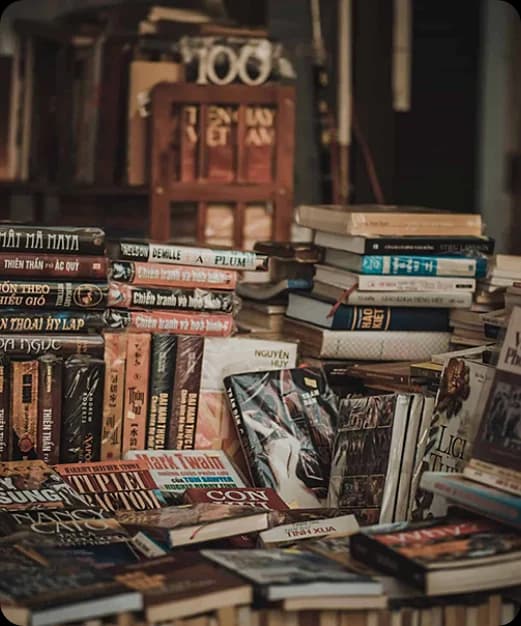 Stack of books including Deep Water by John Bracklan